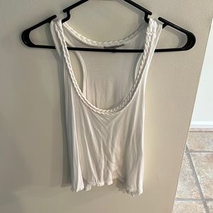 Plain white tank top from Charlotte Russe with a braided front.